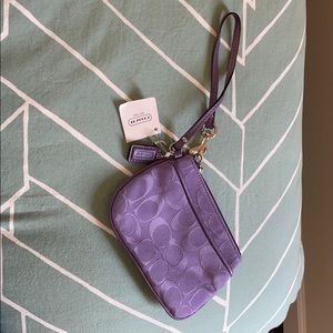 Purple Coach wristlet